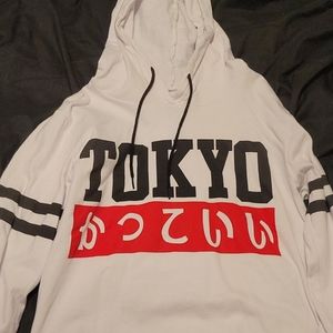 white shirt with black and red lettering